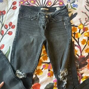 Levi’s 711 black ripped Jeans